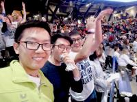 Zhihong (first from left) cheering the Men's Basketball Team of Georgia Tech.
